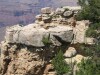 This is one of the odd rock formations around the Grand Canyon.  Note the two natural arches in the picture, one is near the top right corner of the shot, and the other is near the bottom right corner.