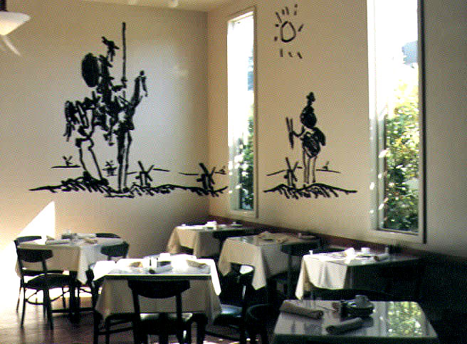A mural that was painted inside of the Tapas restaurant, of Picasso's Don Quiote sketch.